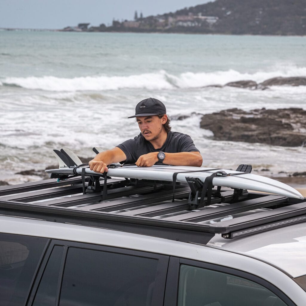 ARB base rack carrying surfboard 