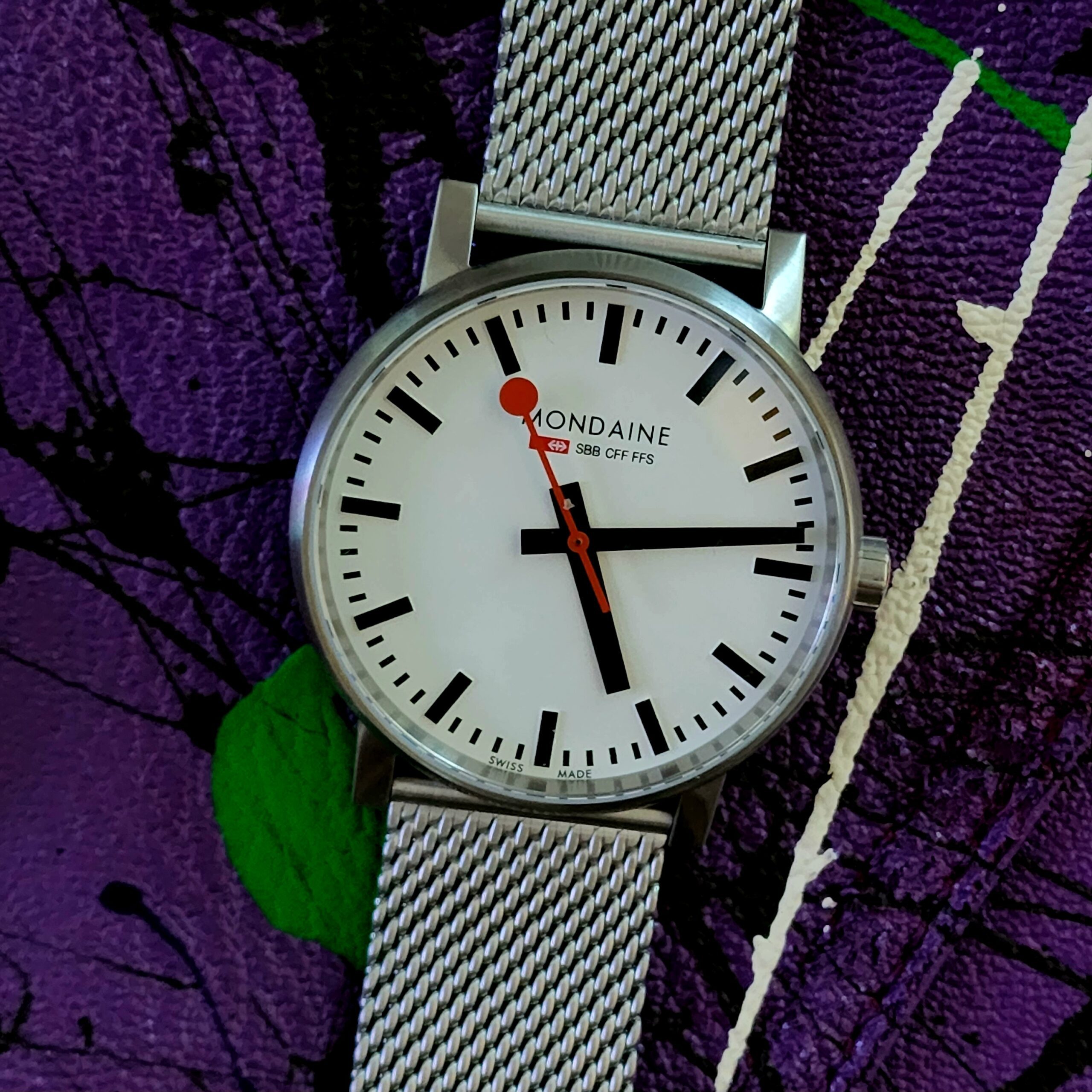 Mondaine Swiss watch with mesh band shot by Vaughn lowery for 360 magazine