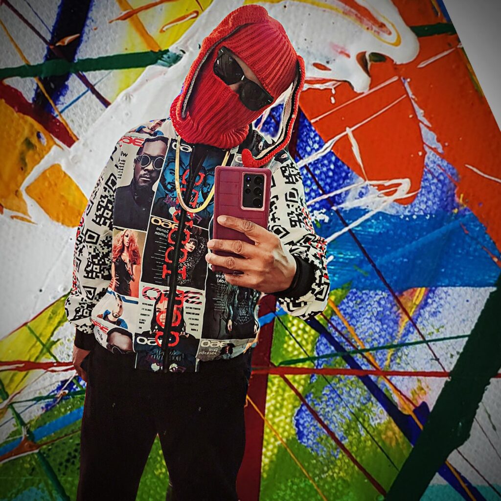 Vaughn Lowery wears 360 MAGAZINE wrapped windbreaker and Privado Eyewear for New York Fashion Week (NYFW) via 360 MAGAZINE.