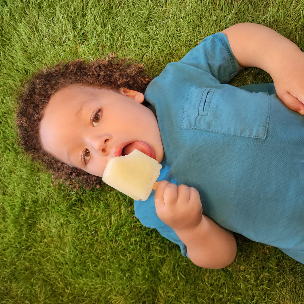 West Sovinsky, photographed by Vaughn Lowery, enjoys a popsicle in honor of Father's Day via 360 MAGAZINE.