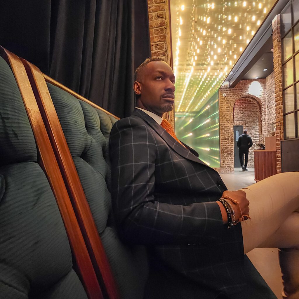 Orator and nightlife curator Arthur J. Rutledge, captured by photographer Vaughn Lowery, prepares to embark on his next endeavor at the Civilian Hotel.