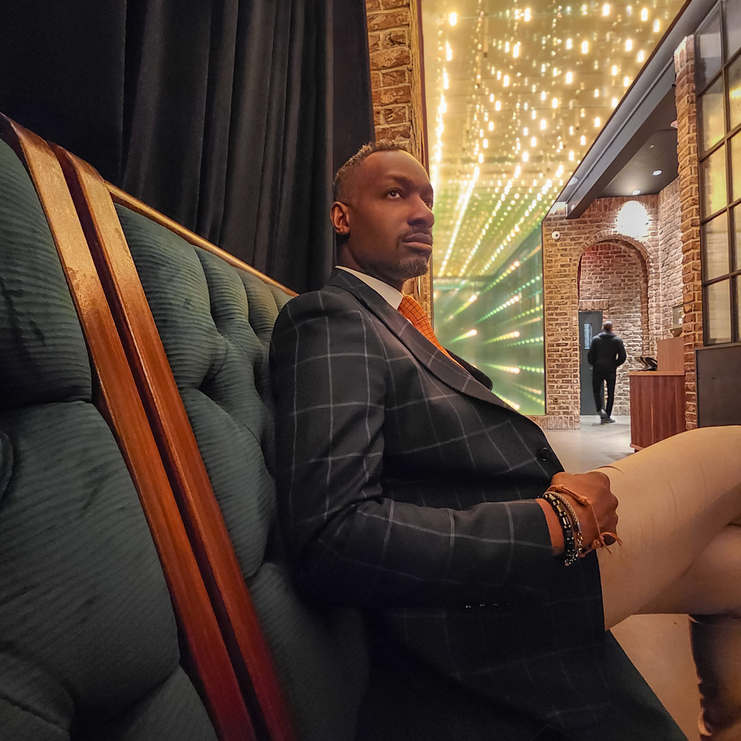 Orator and nightlife curator Arthur J. Rutledge, captured by photographer Vaughn Lowery, prepares to embark on his next endeavor at the Civilian Hotel.

