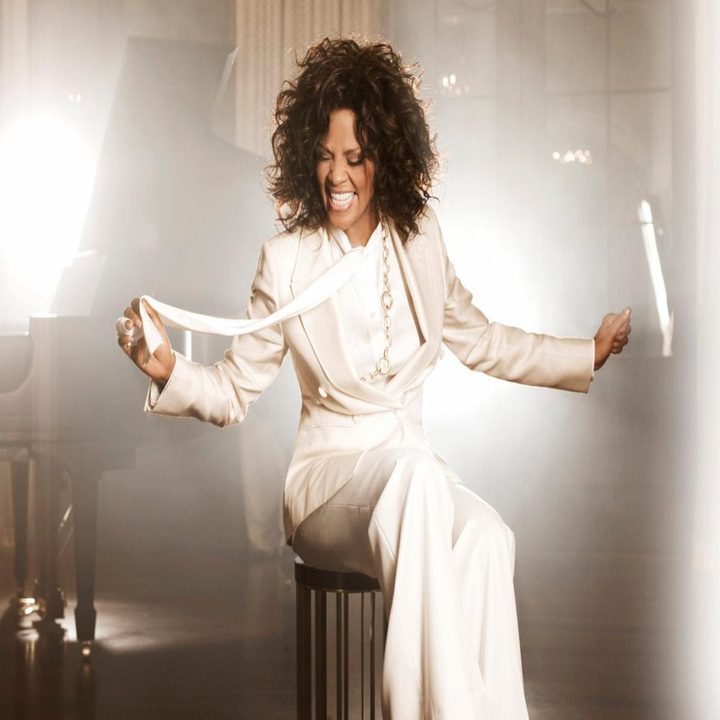Beautiful photo of Whitney Houston herself, wearing all white