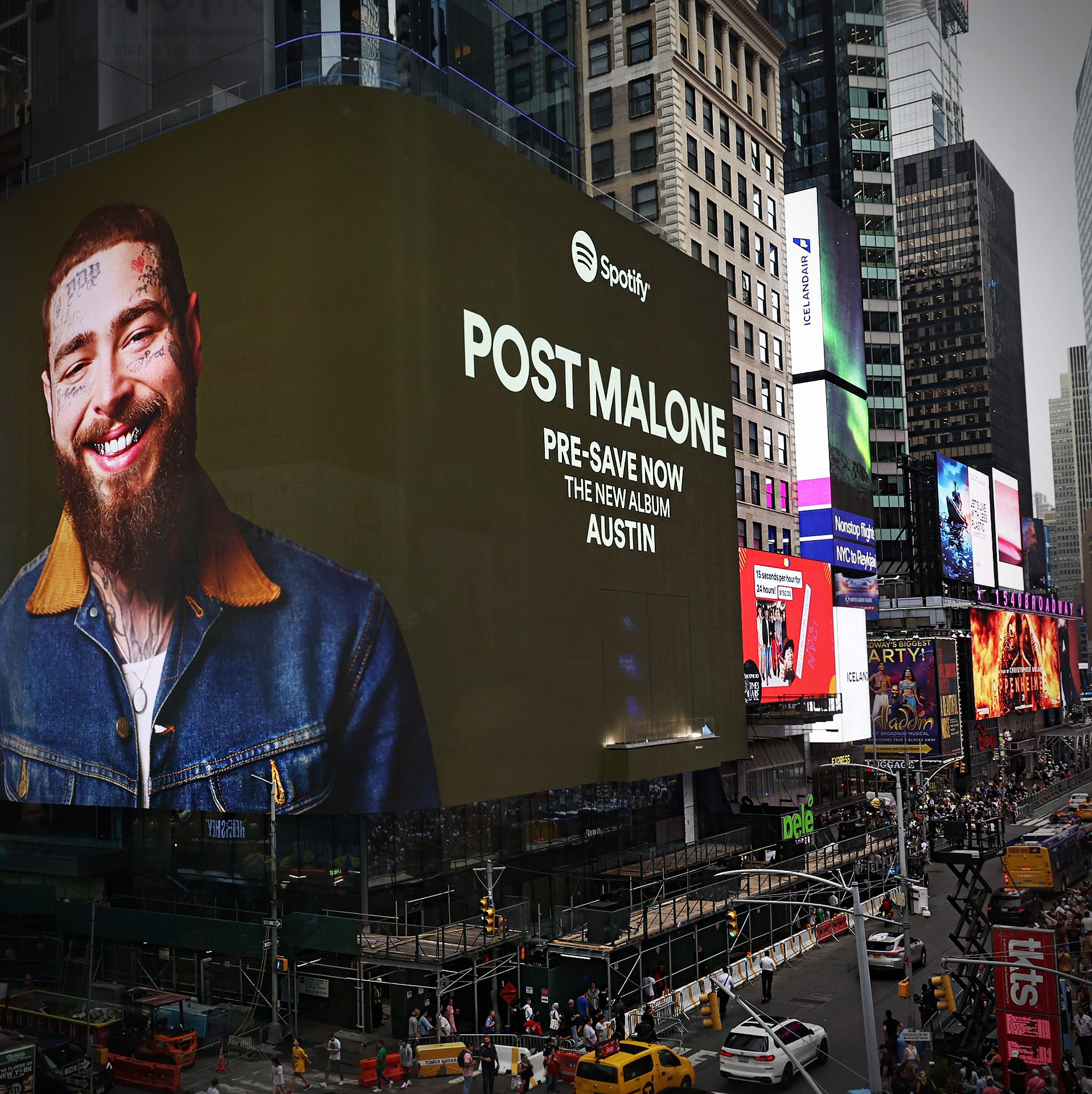 NEW YORK, NEW YORK - JULY 18: Fans gather to watch Post Malone perform live at TSX in Times Square on July 18, 2023 in New York City. (Photo by Jamie McCarthy/Getty Images for TSX Entertainment) via 360 MAGAZINE.