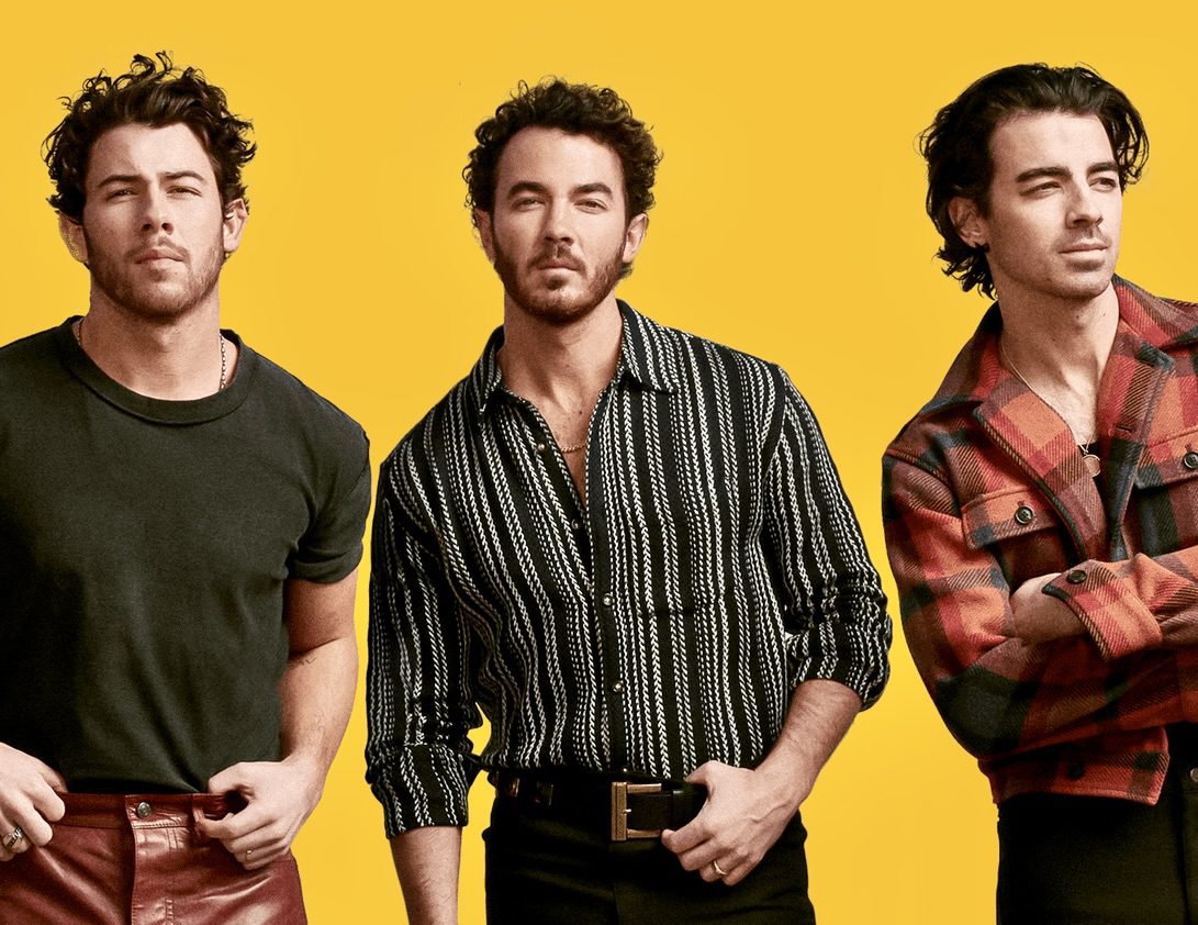 Photo of Jonas Brothers all happy together. Shows all of them together as they continue to sell out performances across the country.