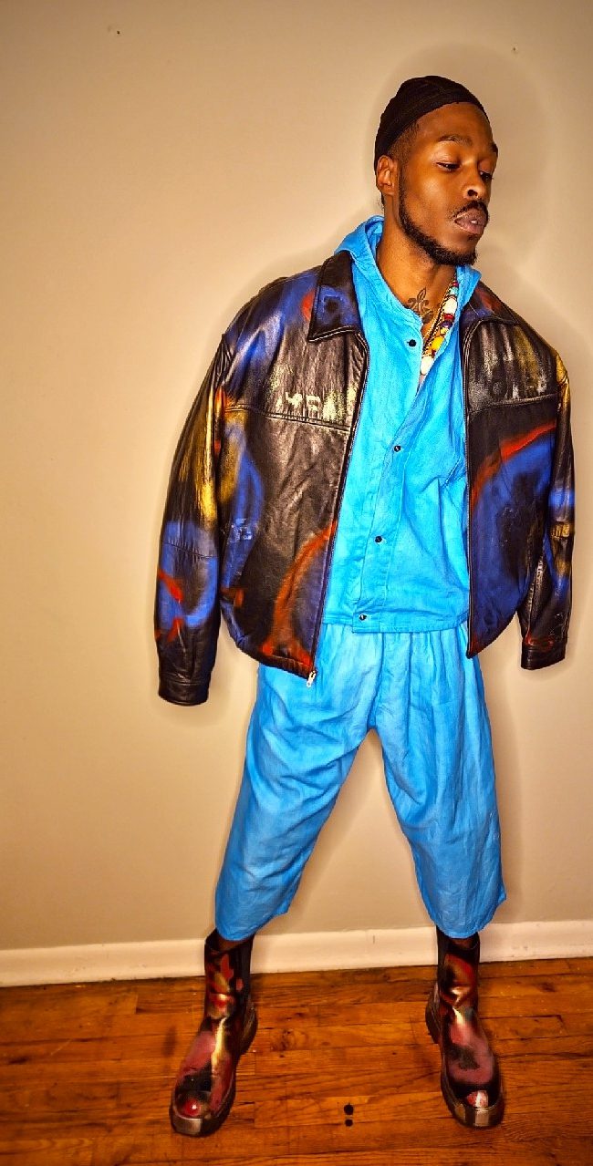 Creative Armon Hayes wears Navajo art brand 4kinship captured by celebrity photographer Vaughn Lowery for 360 MAGAZINE at the Bronx Bodega 4470.