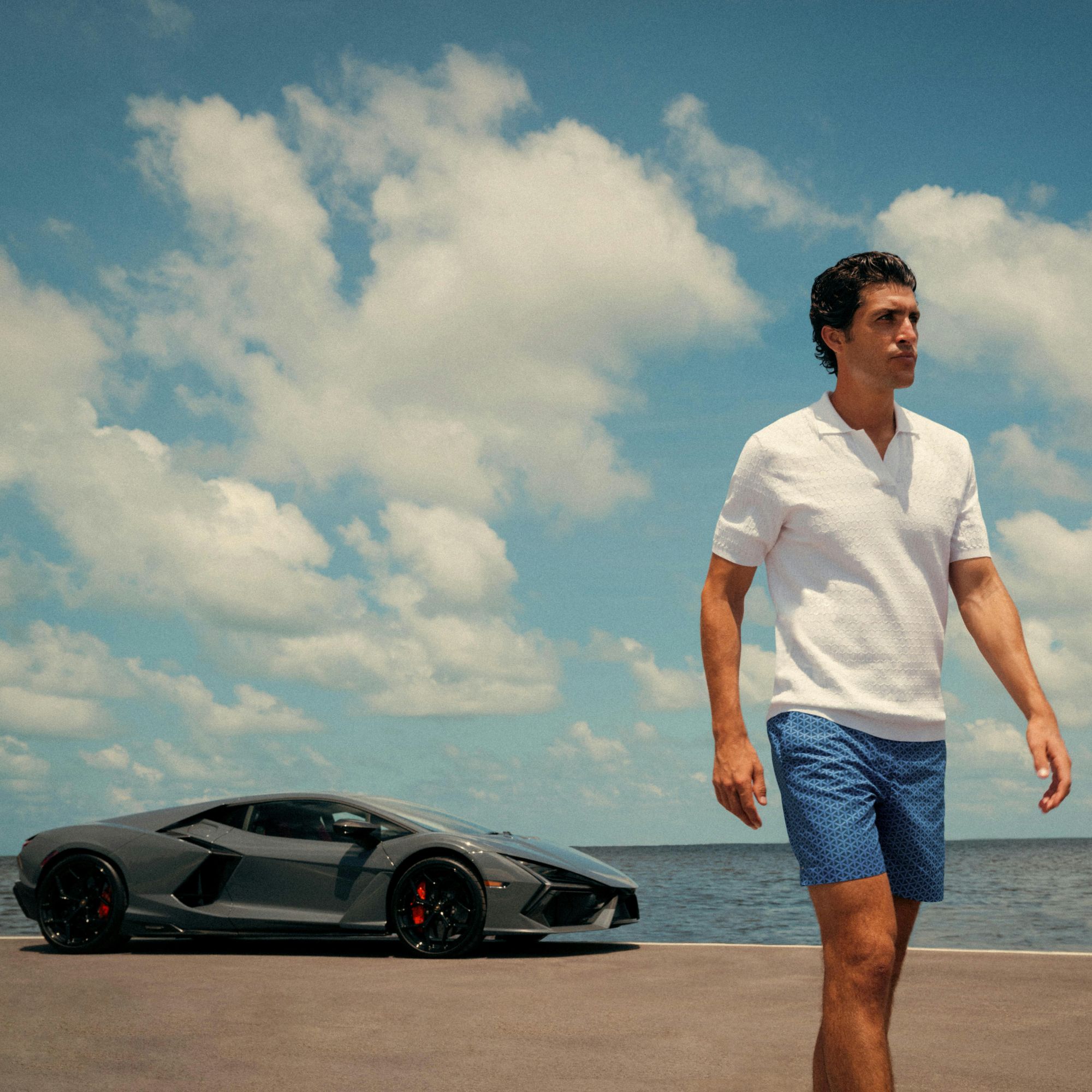 Automobili Lamborghini and Orlebar Brown release a luxury beachwear collection via Vaughn Lowery + 360 MAGAZINE.