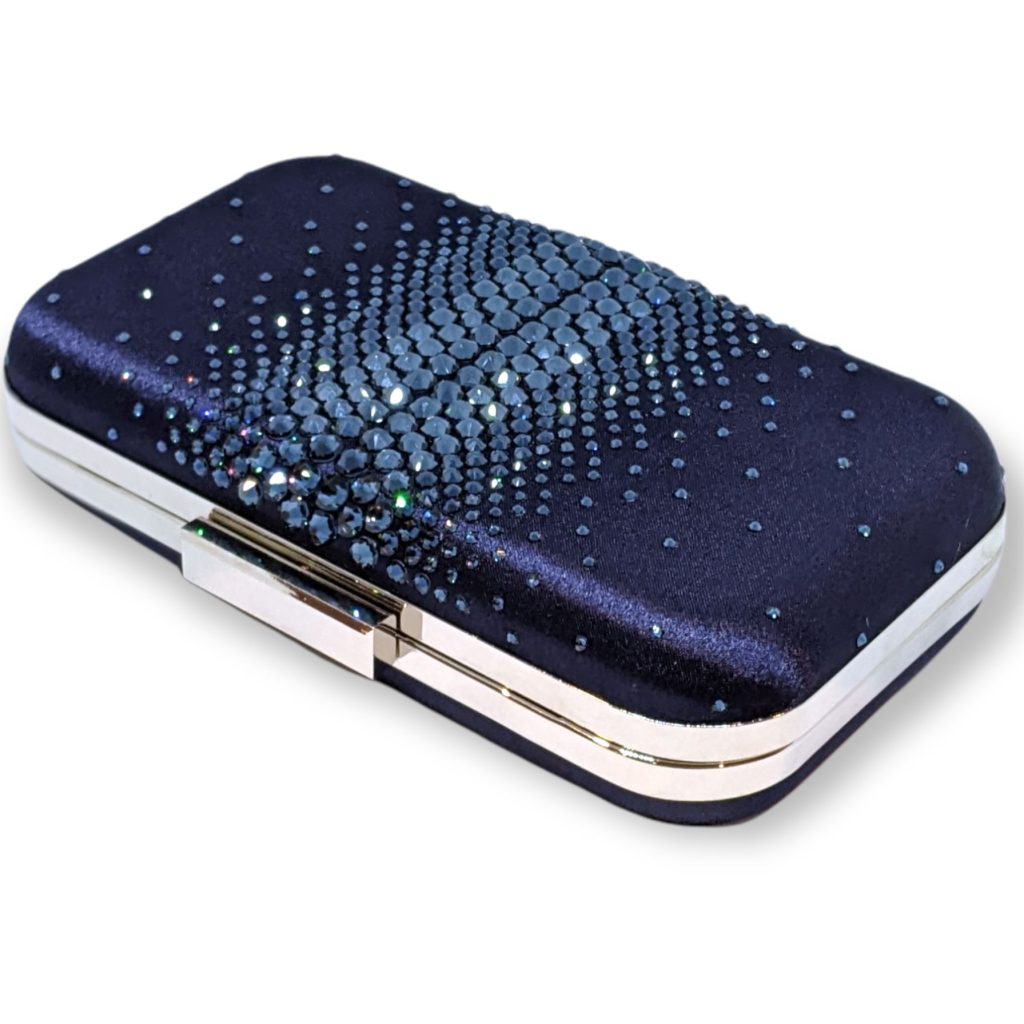 Ariel Taub accessories and clutches via 360 MAGAZINE.   