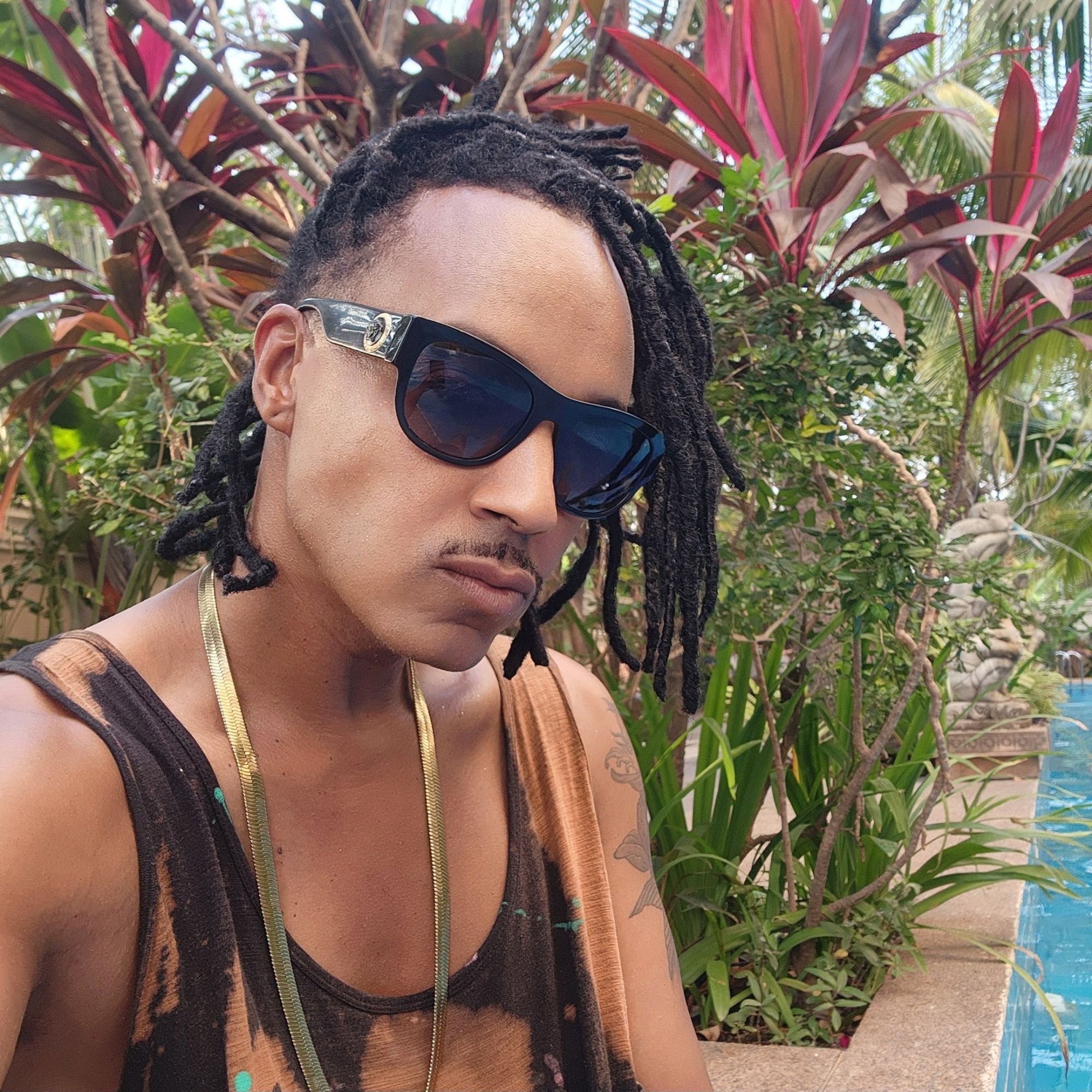 Vaughn Lowery in Phnom Penh Cambodia in Chroy Changvar with custom tank top via 360 MAGAZINE.