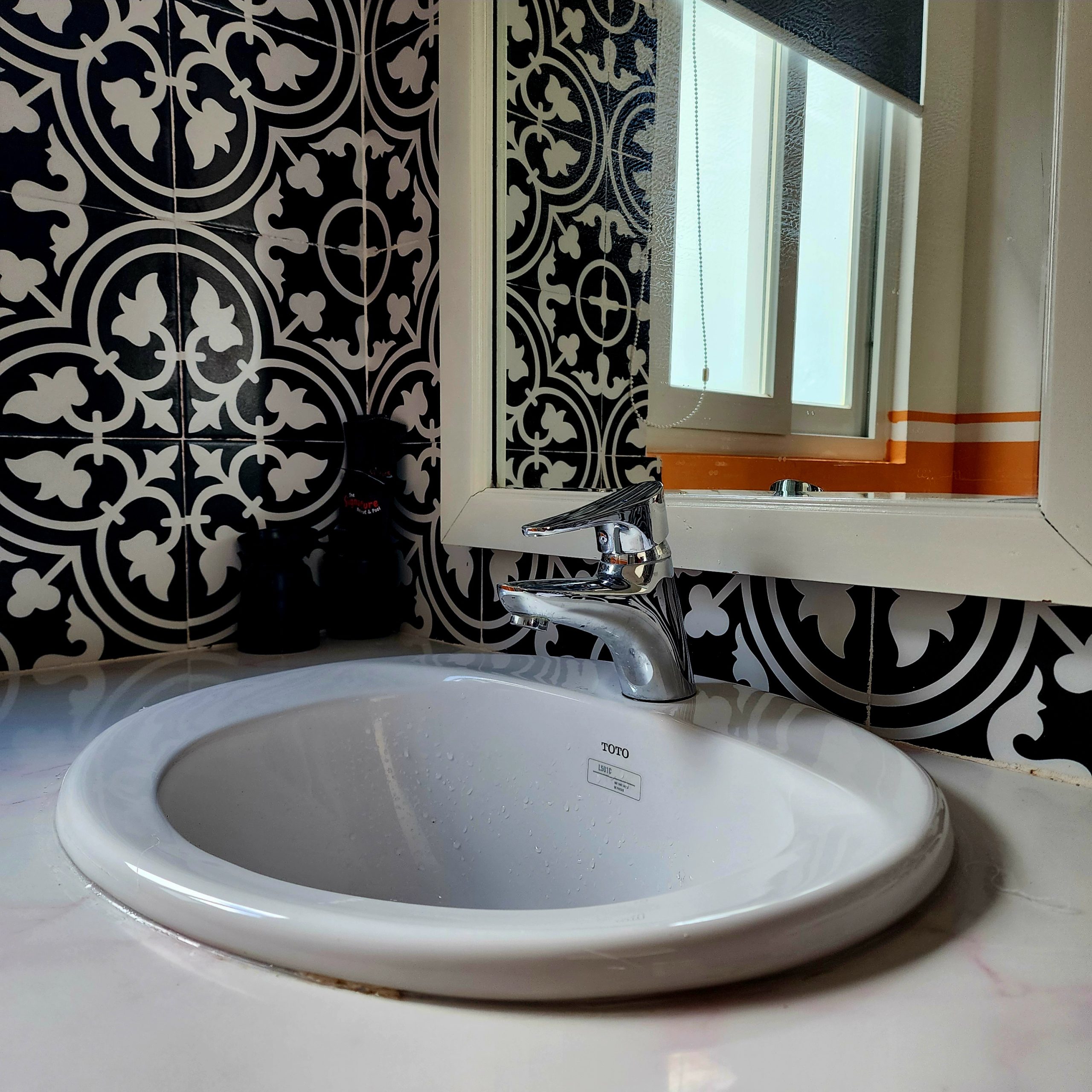 Bathroom faucet and sink for plumbing story via 360 MAGAZINE.