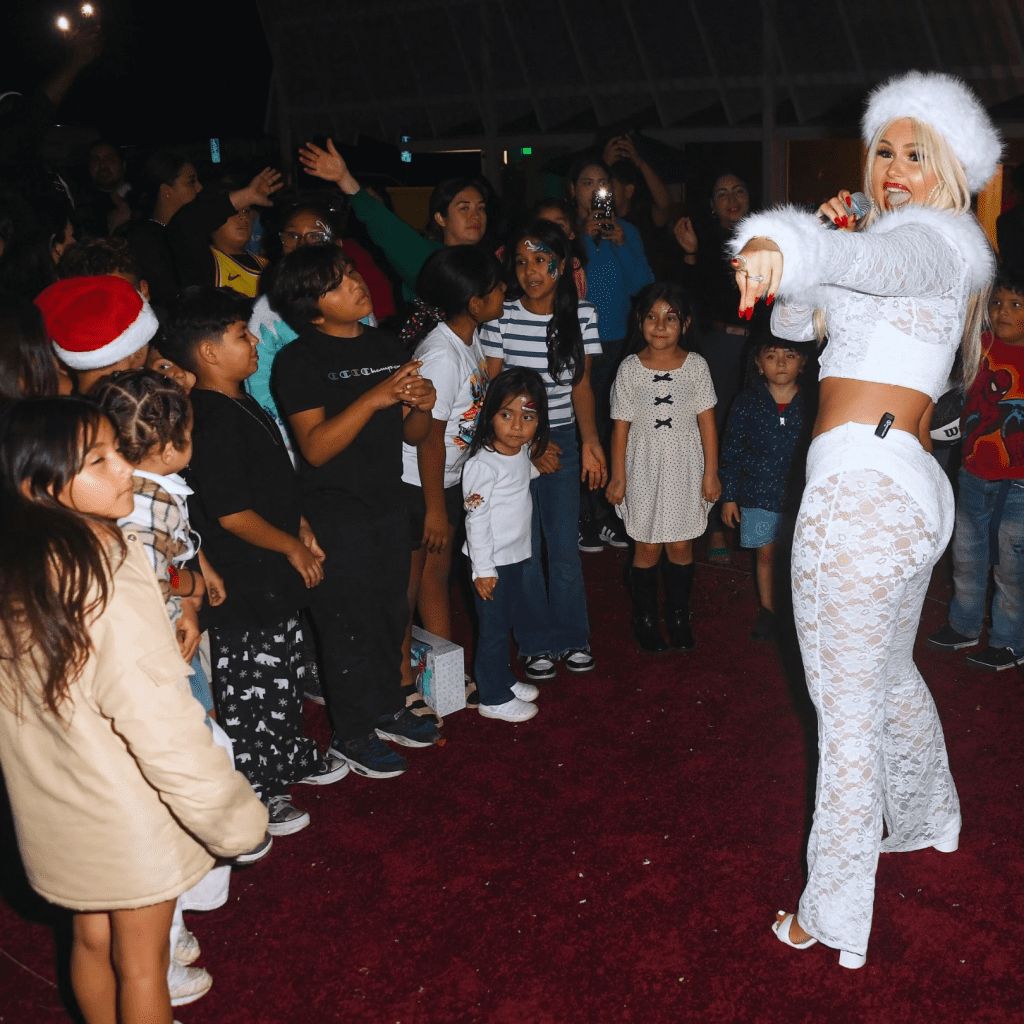 Ashlee Keating Performs at Body by Raven Holiday Charity Event for LA Mission via 360 MAGAZINE.