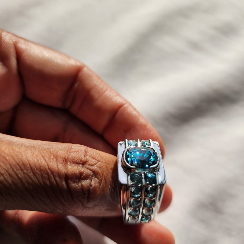 Blue zircon men's ring on white gold in Phnom Penh Cambodia designed by Vaughn Lowery for 360 MAGAZINE.