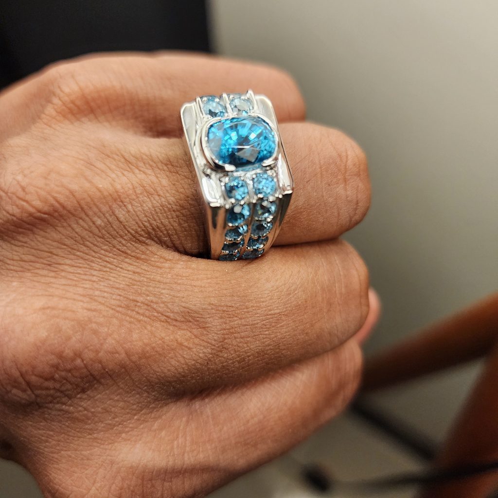 Blue zircon men's ring on white gold in Phnom Penh Cambodia designed by Vaughn Lowery for 360 MAGAZINE.