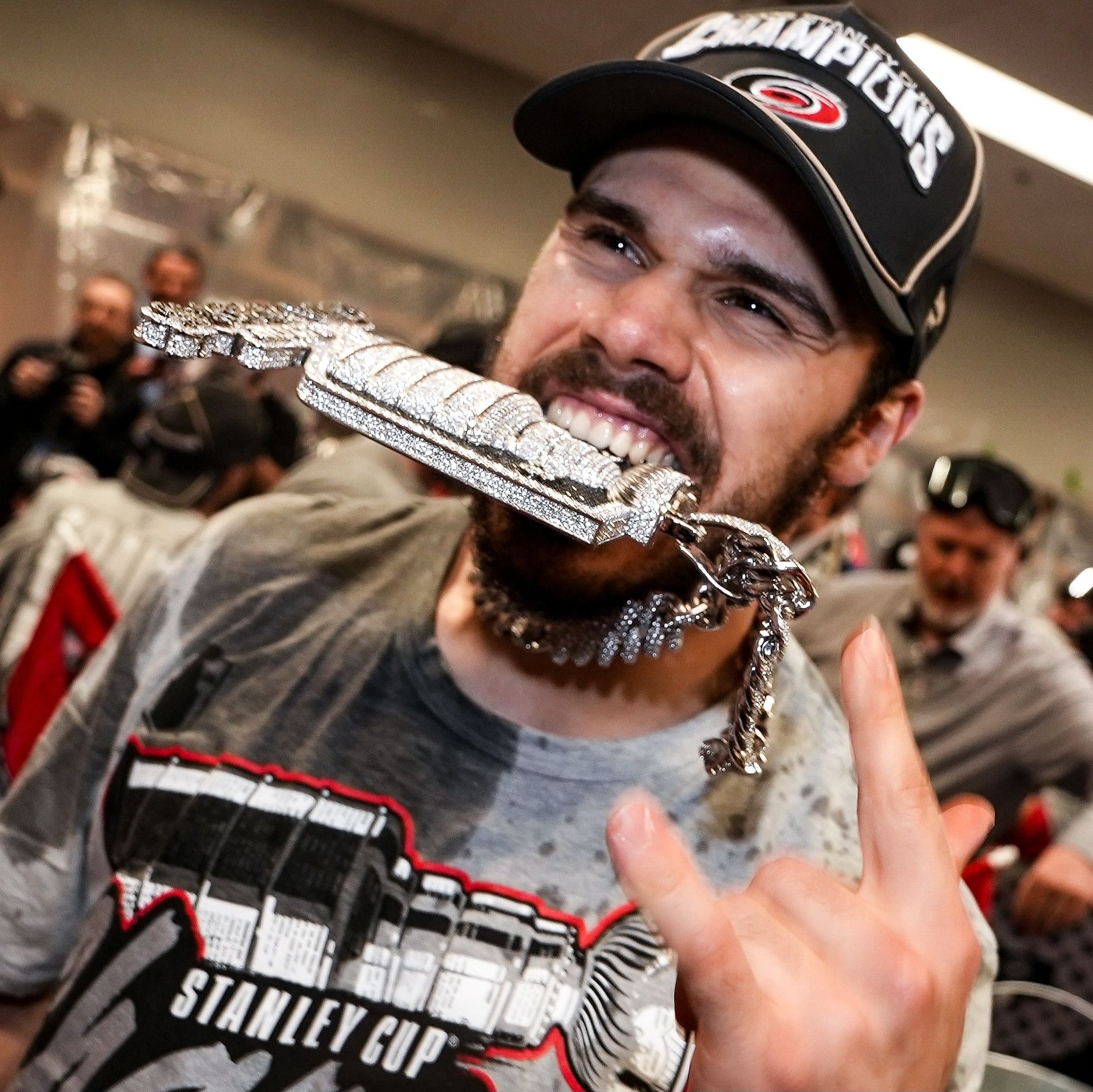 GLD GIFTS CAROLINA HURRICANES CUSTOM ICED-OUT PENDANTS via 360 MAGAZINE.