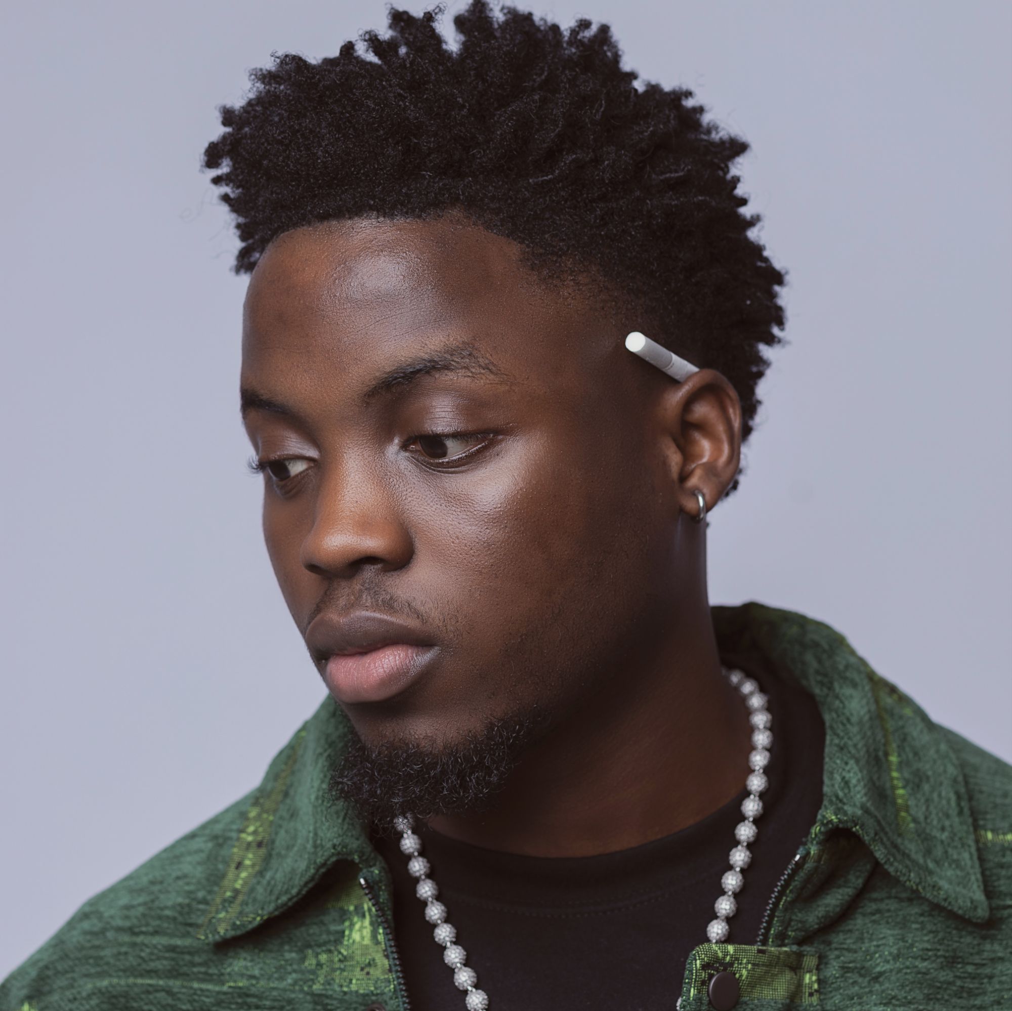 Nigerian Afrobeats star Kunmie interview via Vaughn Lowery and 360 MAGAZINE.